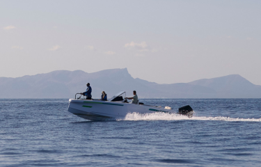 how it works hero banner perons on boat in the sea